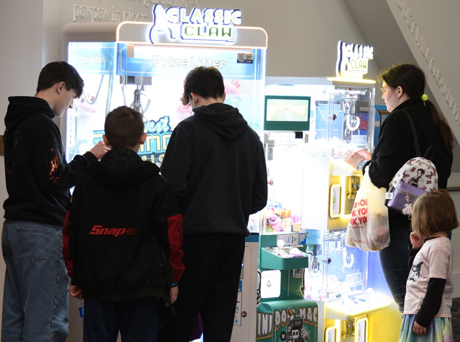 A crowd playing redemption games